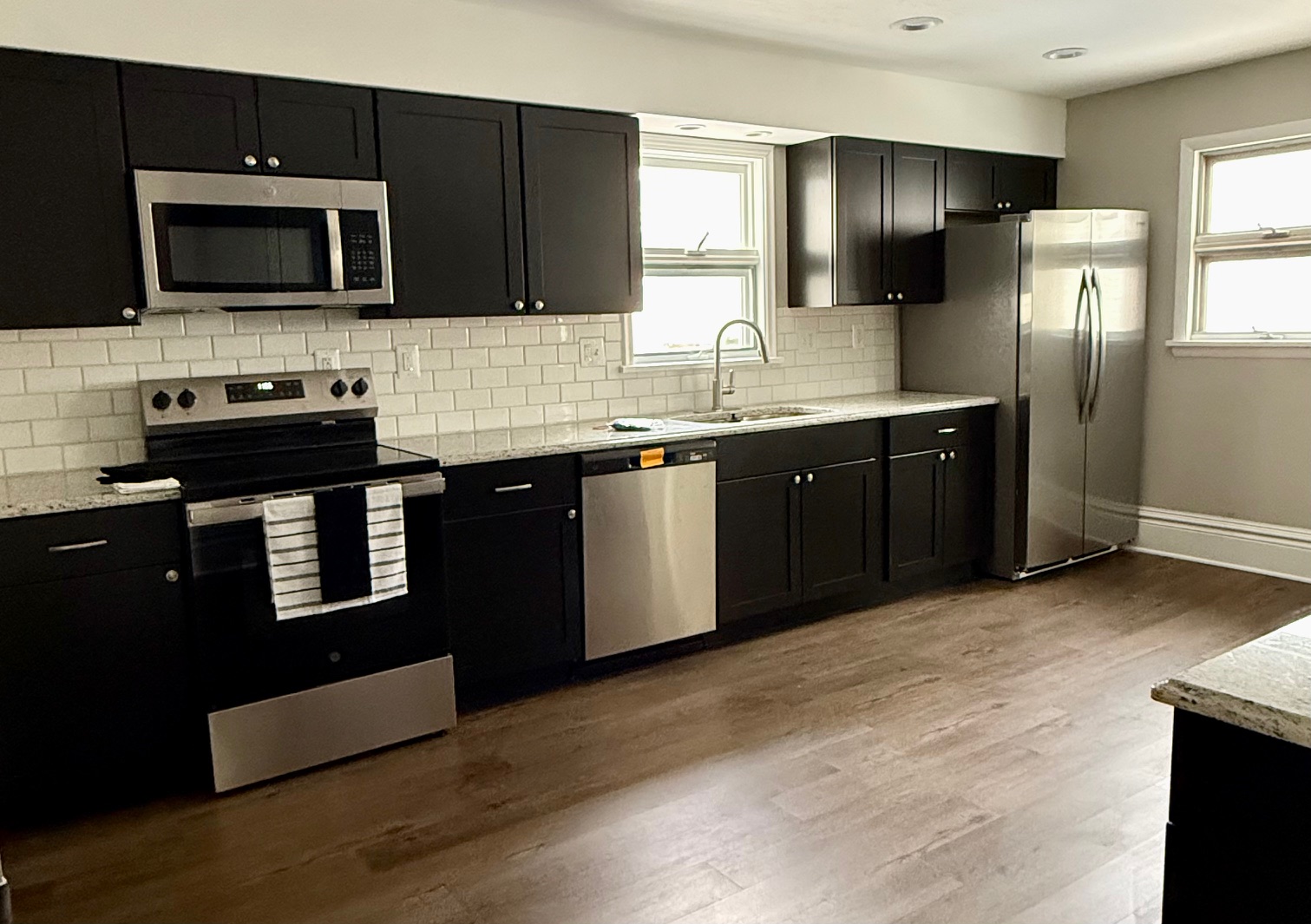 Clyde modern kitchen with stainless appliances