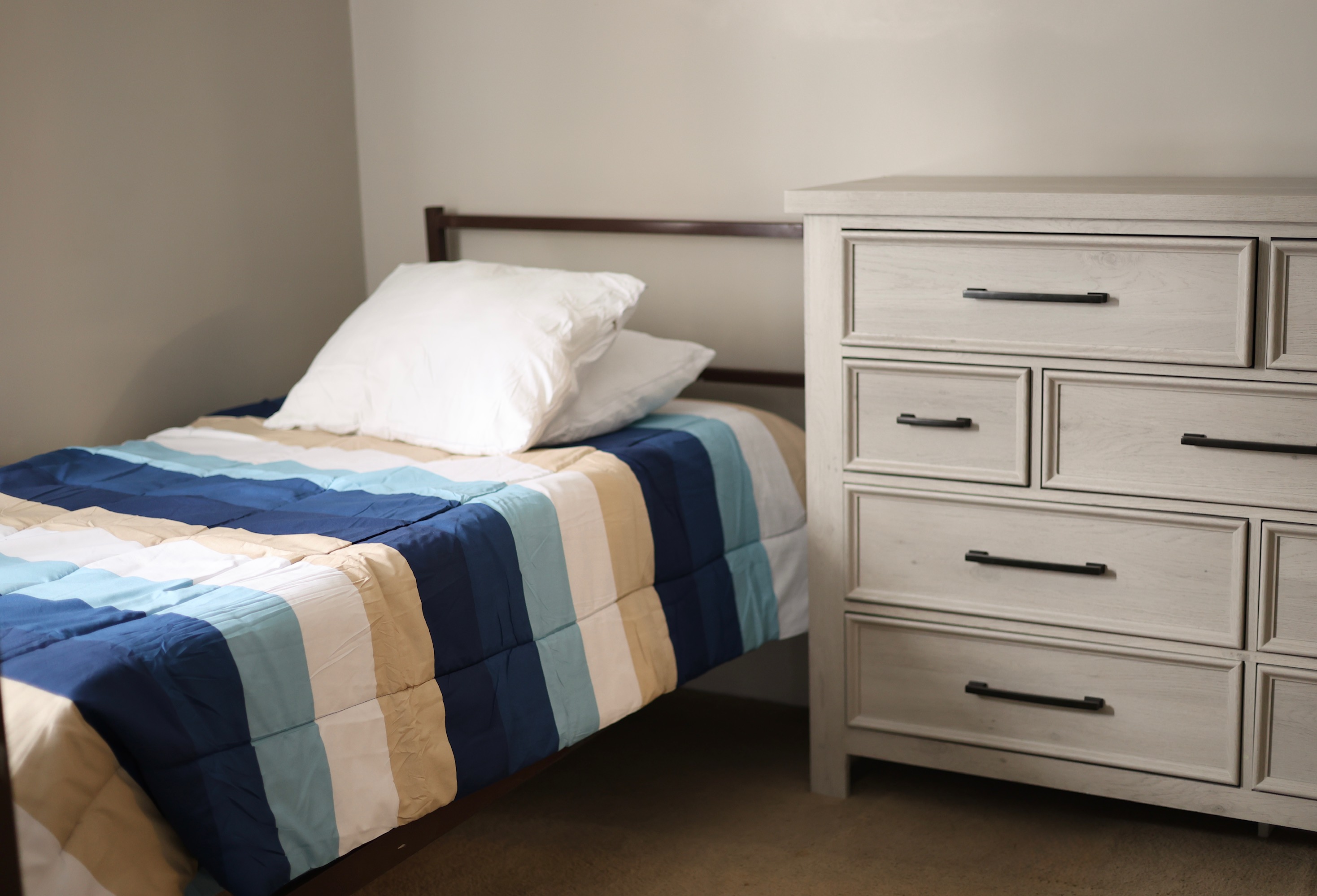 Mansfield bedroom with striped bedding