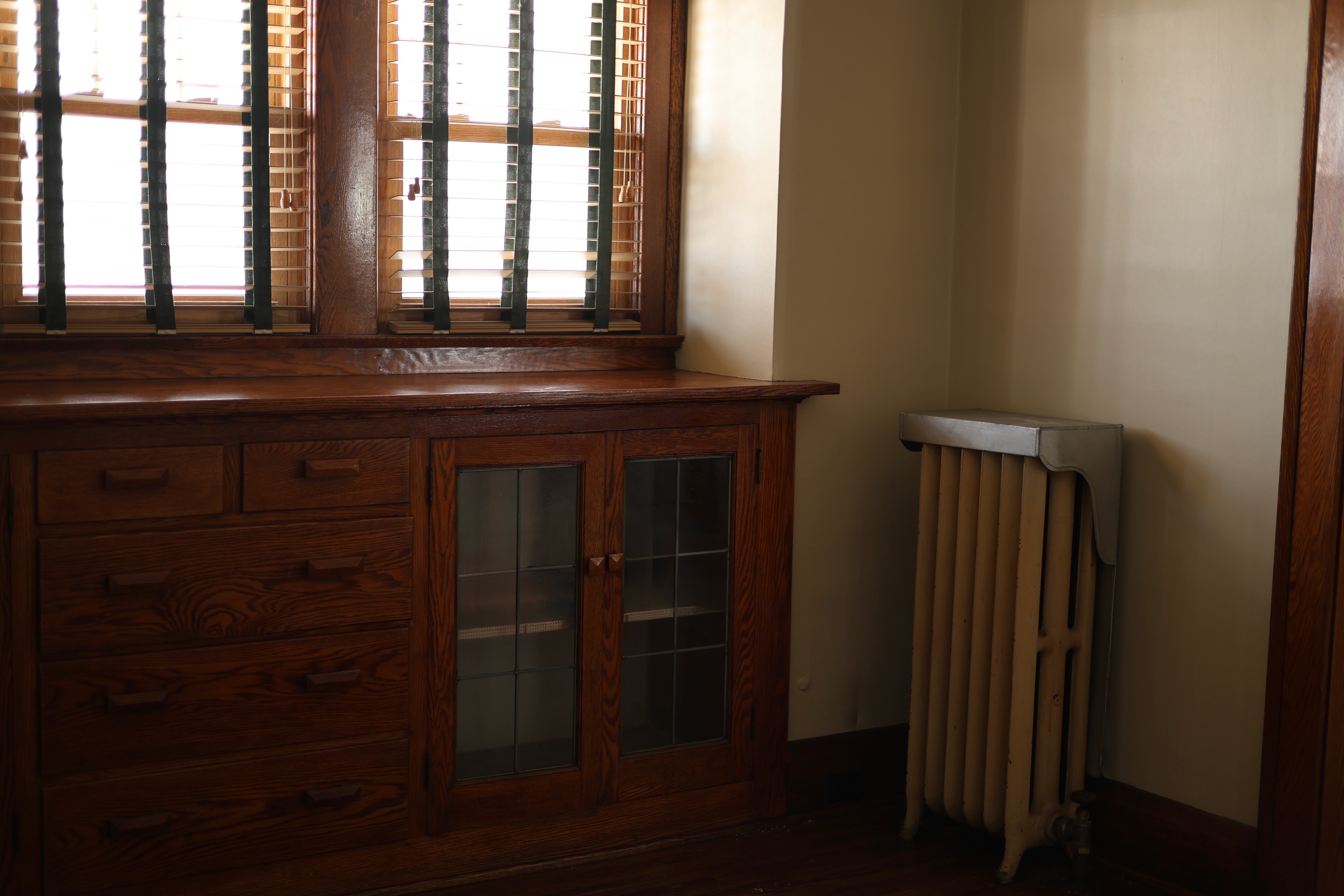 Tiffin built-in oak cabinet with craftsman details